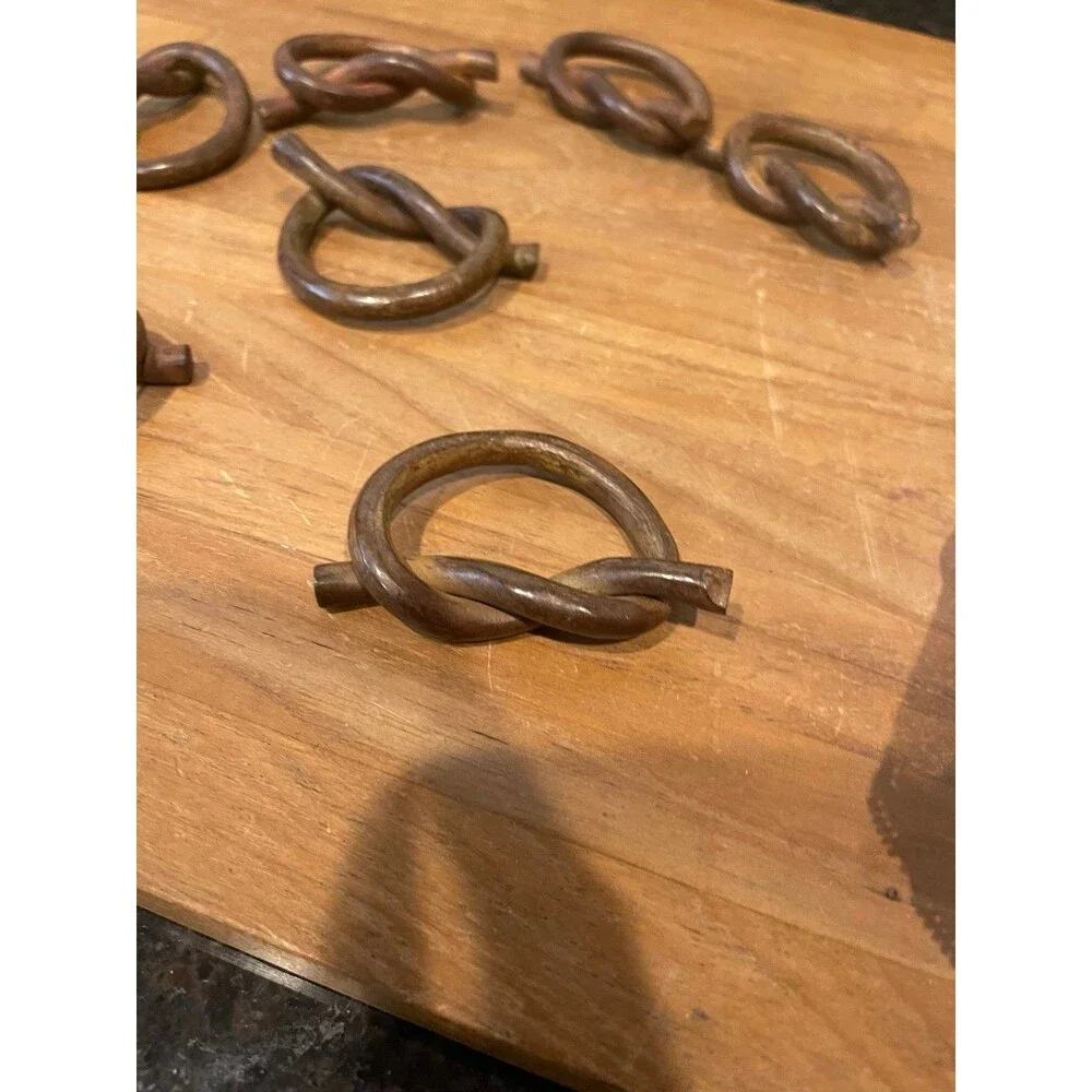 Set of 8 hand-forged iron napkin rings
